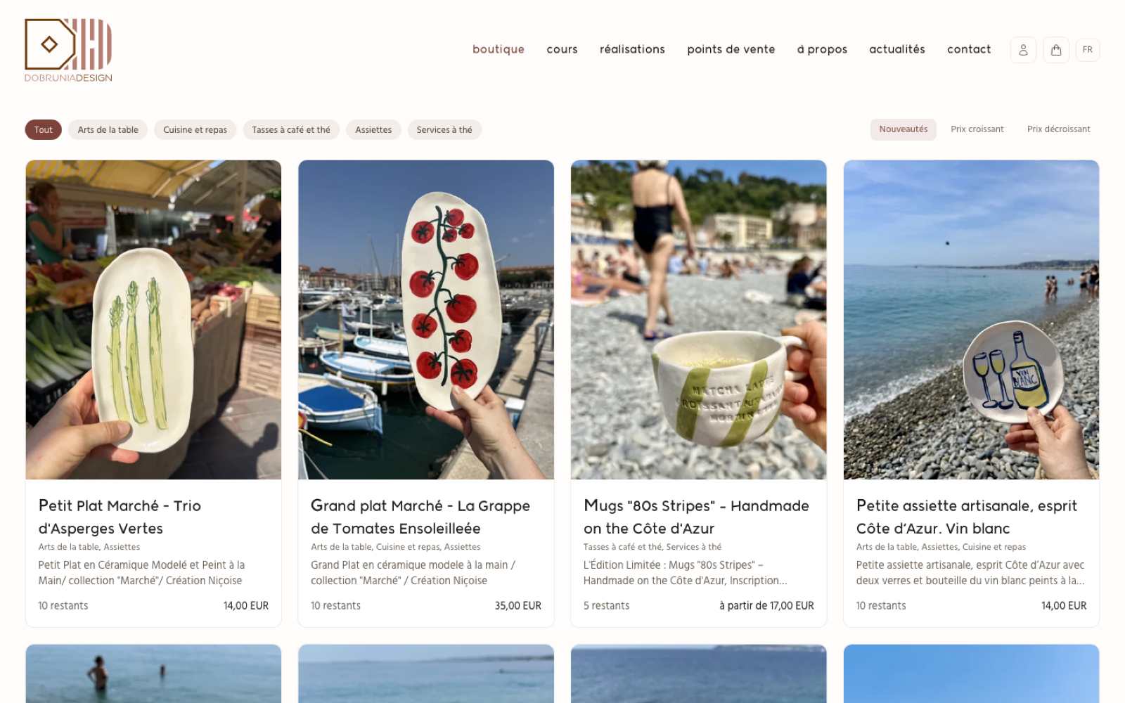 The dobruniadesign.com shop on desktop: the studio's logo, its menu (shop, classes, work, stockists, about, news, contact), collection filters and four hand-painted pieces photographed at a market in Nice and on the beach, each with its stock and price.
